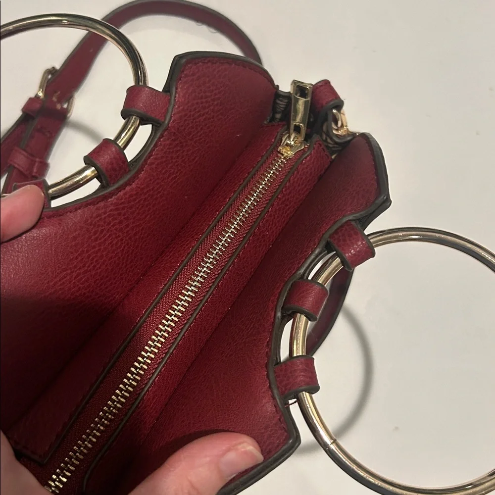 Carlos Santana faux pebbled leather maroon western crossbody bag laser cut rings